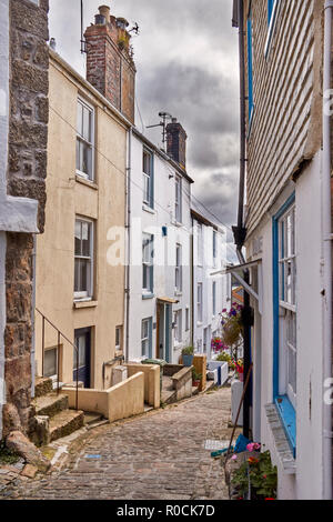 View of a narrow street in the coastal village of St Ives, Cornwall, UK Stock Photo