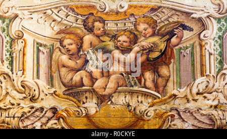 PARMA, ITALY - APRIL 15, 2018: The fresco of the choir of angels with the music instruments in church  Chiesa di Santa Cristina Stock Photo