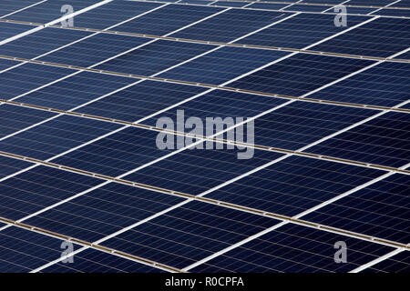 Banks of Solar panels at Kencot Hill solar energy farm,  sited on the old RAF Broadwell base in Devon. Stock Photo