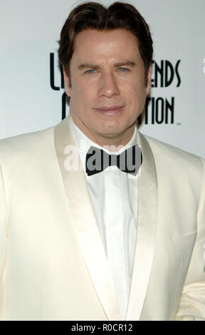 John Travolta arriving at the 5th Annual 'Legends of Aviation' awards ceremony at the Beverly Hilton In Los Angeles.  Headshot eye contact white tuxedo jacketTravoltaJohn 07 Red Carpet Event, Vertical, USA, Film Industry, Celebrities,  Photography, Bestof, Arts Culture and Entertainment, Topix Celebrities fashion /  Vertical, Best of, Event in Hollywood Life - California,  Red Carpet and backstage, USA, Film Industry, Celebrities,  movie celebrities, TV celebrities, Music celebrities, Photography, Bestof, Arts Culture and Entertainment,  Topix, headshot, vertical, one person,, from the year ,  Stock Photo