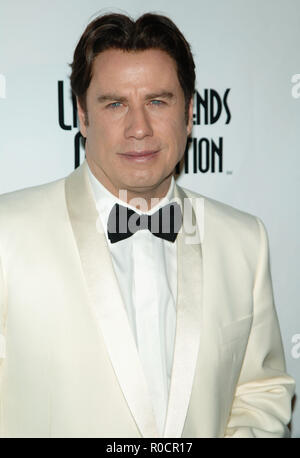 John Travolta arriving at the 5th Annual 'Legends of Aviation' awards ceremony at the Beverly Hilton In Los Angeles.  Headshot eye contact white tuxedo jacketTravoltaJohn 08 Red Carpet Event, Vertical, USA, Film Industry, Celebrities,  Photography, Bestof, Arts Culture and Entertainment, Topix Celebrities fashion /  Vertical, Best of, Event in Hollywood Life - California,  Red Carpet and backstage, USA, Film Industry, Celebrities,  movie celebrities, TV celebrities, Music celebrities, Photography, Bestof, Arts Culture and Entertainment,  Topix, headshot, vertical, one person,, from the year ,  Stock Photo