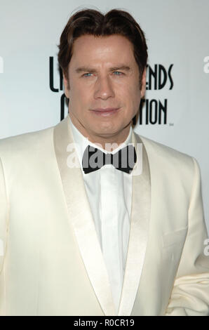 John Travolta arriving at the 5th Annual 'Legends of Aviation' awards ceremony at the Beverly Hilton In Los Angeles.  Headshot white tuxedo jacketTravoltaJohn 14 Red Carpet Event, Vertical, USA, Film Industry, Celebrities,  Photography, Bestof, Arts Culture and Entertainment, Topix Celebrities fashion /  Vertical, Best of, Event in Hollywood Life - California,  Red Carpet and backstage, USA, Film Industry, Celebrities,  movie celebrities, TV celebrities, Music celebrities, Photography, Bestof, Arts Culture and Entertainment,  Topix, headshot, vertical, one person,, from the year , 2008, inquir Stock Photo