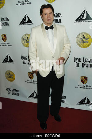 John Travolta arriving at the 5th Annual 'Legends of Aviation' awards ceremony at the Beverly Hilton In Los Angeles.  full length eye contact white tuxedo jacketTravoltaJohn 06 Red Carpet Event, Vertical, USA, Film Industry, Celebrities,  Photography, Bestof, Arts Culture and Entertainment, Topix Celebrities fashion /  Vertical, Best of, Event in Hollywood Life - California,  Red Carpet and backstage, USA, Film Industry, Celebrities,  movie celebrities, TV celebrities, Music celebrities, Photography, Bestof, Arts Culture and Entertainment,  Topix, vertical, one person,, from the year , 2008, i Stock Photo