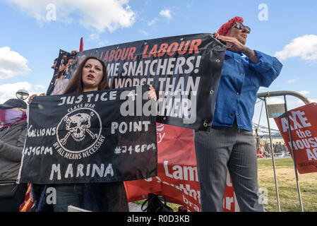 London, UK. 3rd November 2018. Class War supporters came to the 'No Demolitions Without Permission' housing protest at City Hall with banners declaring that Labour Councils were the biggest social cleansers in London and 'Labour, Labour Home Snatchers! Even Worse Than Maggie Thatcher', pointing out that it was largely Labour councils who were demolishing council estates so that developers could replace council houses with large numbers of properties sold at high market prices and a miserably small number of homes at social rent, promoting schemes which cut by thousands the number of council ho Stock Photo