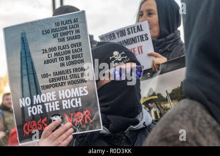 London, UK. 3rd November 2018. Class War supporters came to the 'No Demolitions Without Permission' housing protest at City Hall with banners declaring that Labour Councils were the biggest social cleansers in London and 'Labour, Labour Home Snatchers! Even Worse Than Maggie Thatcher', pointing out that it was largely Labour councils who were demolishing council estates so that developers could replace council houses with large numbers of properties sold at high market prices and a miserably small number of homes at social rent, promoting schemes which cut by thousands the number of council ho Stock Photo