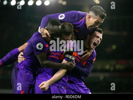 London, UK. 3rd Nov, 2018. Liverpool's James Milner (2nd L) celebrates after scoring during the English Premier League match between Arsenal and Liverpool at the Emirates Stadium in London, Britain on Nov. 3, 2018. Credit: Han Yan/Xinhua/Alamy Live News Stock Photo