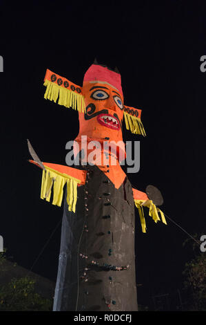 Ravan Ravana effigy standing against night sky on dussera Stock Photo