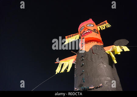 Ravan Ravana effigy standing against night sky on dussera Stock Photo