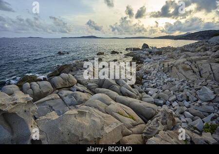 Beautiful southern coast of Sardinia made of stones and granite rocks that form a natural conformation of absolute scenic impact. Stock Photo