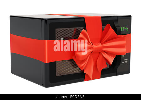 Microwave oven with ribbon and bow, gift concept. 3D rendering isolated on white background Stock Photo