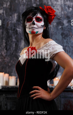 Photo of zombie girl with grim bodypainting on face Stock Photo