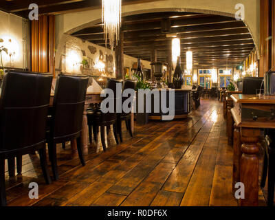 Interior of a vintage restaurant at night Stock Photo