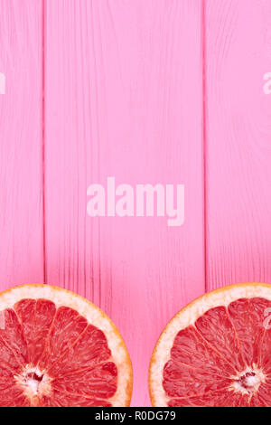 Cutted grapefruit with copy space on top. Stock Photo