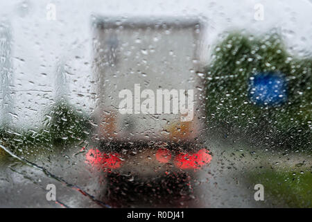 Abstract background - View through a rain drop on a truck. Stock Photo