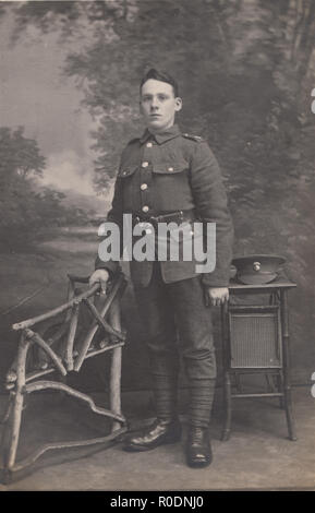 Vintage Photographic Postcard of a Young British WW1 Soldier From The Royal Scots Regiment. Stock Photo