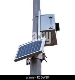 Scientific Equipment Powerded by a Solar Panel on a Pole, Isolated on White Stock Photo