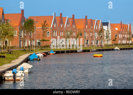 Street with New Modern Houses in an Urban Area in the Netherlands Stock Photo