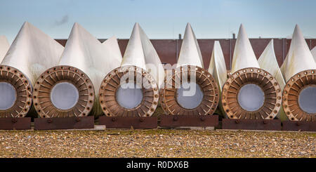 A row of spare wind turbine wings on wins turbine maintenance yard Stock Photo