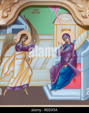 REGGIO EMILIA, ITALY - APRIL 12, 2018: The icon of Annunciation on the iconostas in church Chiesa di San Giorgio in Reggio Emilia from 20 cent. Stock Photo