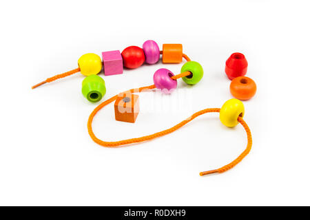Wooden Beads on a String making a Colorful Toy Necklace Stock Photo
