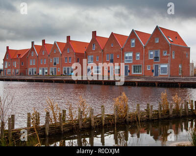 Street with New Modern Houses in an Urban Area in the Netherlands Stock Photo