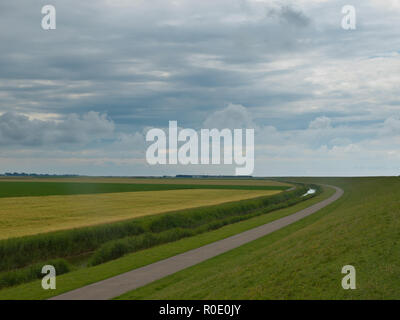 Dramatic sky above typical dutch rural landscape Stock Photo