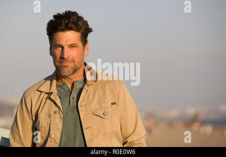 Half-Length Portrait of Mid-Adult Man at Beach Stock Photo