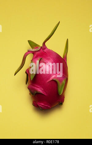 Dragon Fruit on Yellow Background Stock Photo