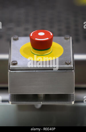 Emergency ON/OFF industrial switch of a food industry equipment. Emergency stop Stock Photo