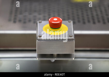 Emergency ON/OFF industrial switch of a food industry equipment. Emergency stop Stock Photo