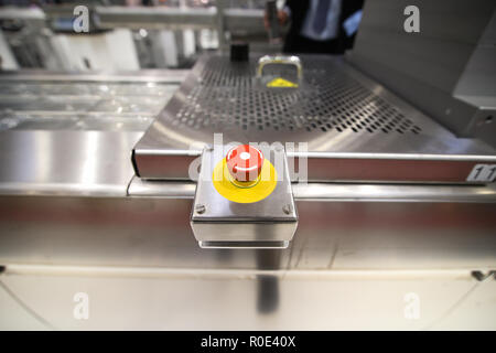 Emergency ON/OFF industrial switch of a food industry equipment. Emergency stop Stock Photo