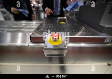 Emergency ON/OFF industrial switch of a food industry equipment. Emergency stop Stock Photo
