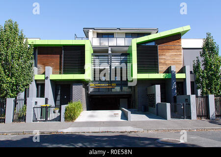 Melbourne, Australia: April 04, 2018: Modern designed apartment building in the suburb of St Kilda with a balcony, roof garden and underground parking Stock Photo