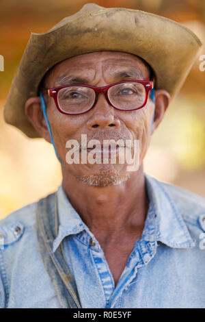 SAI YOK, THAILAND, JANUARY 22, 2016 : A thai motorbike taxi is posing along the road at Sai Yok in kanchanaburi province, Thailand Stock Photo