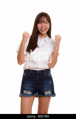 Young happy Asian teenage girl smiling looking motivated Stock Photo