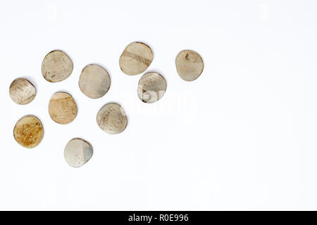Bankruptcy concept , Pressed coins close up, top view on white background Stock Photo
