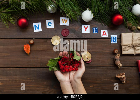 the inscription at the Christmas new year background with Christmas tree and gifts Stock Photo