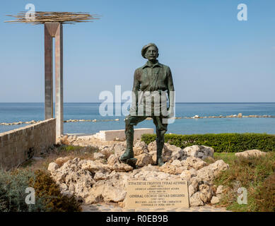 The Statue of General George Grivas-Dhigenis leader of the liberation struggle of EOKA 1955-59 on the shoreline in Chlorakas, Paphos Cyprus. Stock Photo