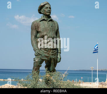 The Statue of General George Grivas-Dhigenis leader of the liberation struggle of EOKA 1955-59 on the shoreline in Chlorakas, Paphos Cyprus. Stock Photo