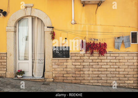 Peperoni cruschi, sun dried red chili peppers in Spinazzola, Puglia Stock Photo