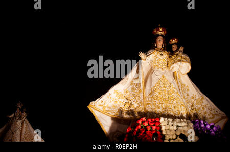 Images of the Virgin of the Rosary displayed during a religious ceremony outside the Templo of Santo Domingo Catholic church in Oaxaca, Mexico Stock Photo