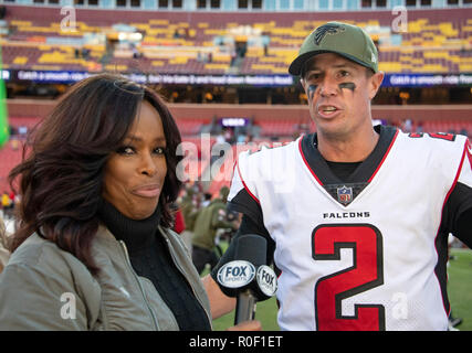 FOX sports sideline reporter Pam Oliver reports on the field after an NFL  football game between the Minnesota Vikings and the Green Bay Packers,  Sunday, Nov. 21, 2021, in Minneapolis. The Vikings