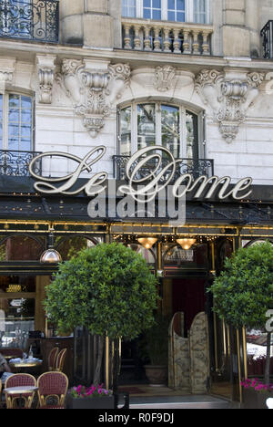 Le Dome, an historic cafe that was popular with many writers and artists in the Montparnasse area of Paris, France. Stock Photo
