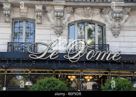 Le Dome, an historic cafe that was popular with many writers and artists in the Montparnasse area of Paris, France. Stock Photo