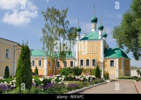 Monastic Garden and Annunciation Church Framed By Trees Stock Photo