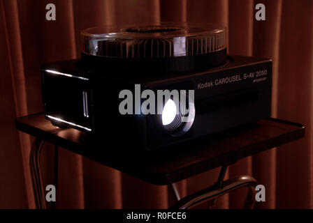 Kodak Carousel S-AV 2050 35mm slide projector with ambient lights off Stock Photo