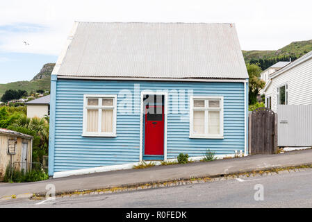 Houses on the hilly street of Lyttelton Christchurch New Zealand Stock Photo