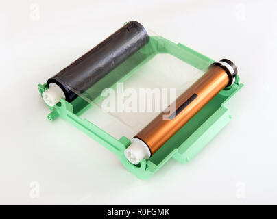 Ribbon cartridge on table ready to be loaded in a sublimation printer Stock Photo