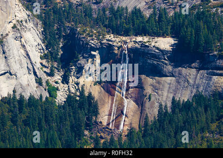 The view from Glacier Point in Yosemite National Park. Half Dome, Vernal Falls lower and Navada Falls upper . Stock Photo