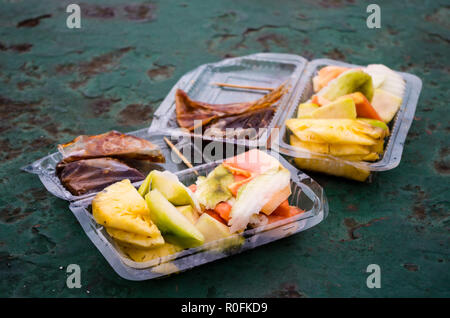 RUJAK - traditional fruit and vegetable salad in Indonesia, two rujaks bought on a ferry Stock Photo